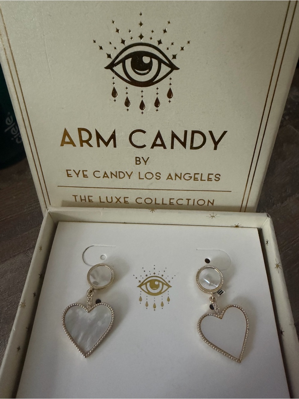 Arm Candy by Eye Candy Los Angeles Heart Earrings Gold and White Heart Drop